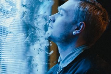 men s black and gray collared top